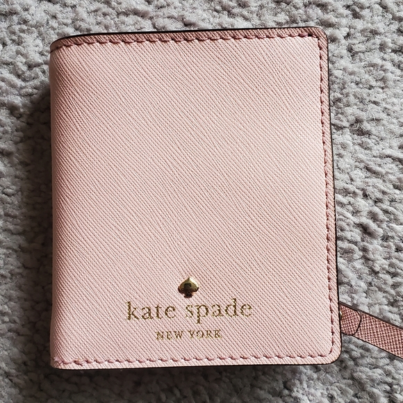 kate spade Handbags - Pink Kate Spade compact wallet.